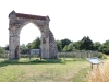 The Priory arch and information boards