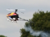 Model helicopter flying display at the fete